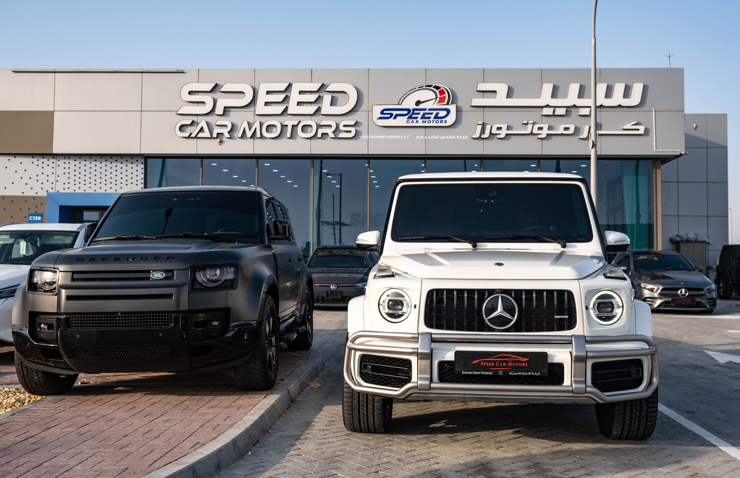 Dealer shaking hands with customer